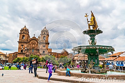 View of Plaza de Armas with The Statue of Pachacuti and The Cathedral Basilica of the Assumption of the Virgin in Peru Editorial Stock Photo