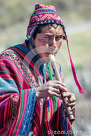 Cusco / Peru - May 29.2008: Portrait of a man, shepherd, goat herder, dressed up in native, peruvian costume Editorial Stock Photo