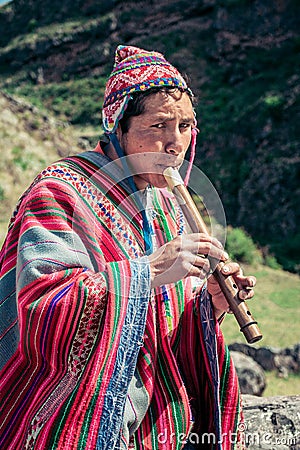 Cusco / Peru - May 29.2008: Portrait of a man, shepherd, goat herder, dressed up in native, peruvian costume Editorial Stock Photo