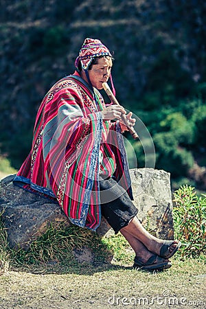 Cusco / Peru - May 29.2008: Portrait of a man, shepherd, goat herder, dressed up in native, peruvian costume Editorial Stock Photo