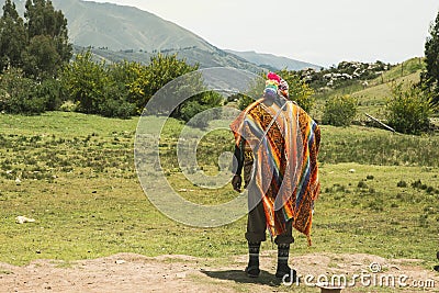 Cusco, PerÃº; December 20, 2018, native man, Peruvian elder, in ritual to coca Editorial Stock Photo