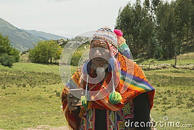 Cusco, PerÃº; December 20, 2018, native man, Peruvian elder, in ritual to coca Editorial Stock Photo