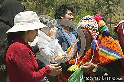 Cusco, PerÃº; December 20, 2018, Peruvian elder, in ritual to coca Editorial Stock Photo
