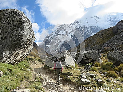 Cusco Province, Peru - May 8th, 2016: A young group of international hikers, led by their local Inca guide, navigate the Andes mo Editorial Stock Photo