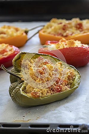 Cuscus, roasted peppers fresh from the oven stuffed with couscous with vegetables Stock Photo