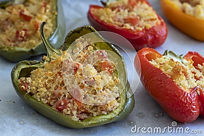 Cuscus, roasted peppers fresh from the oven stuffed with couscous with vegetables Stock Photo