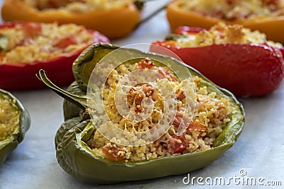 Cuscus, roasted peppers fresh from the oven stuffed with couscous with vegetables Stock Photo