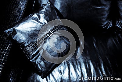 Cushion on the black couch Stock Photo