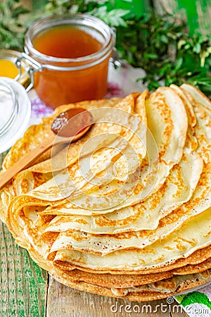 Custard pancakes from kefir and boiling water with jam Stock Photo