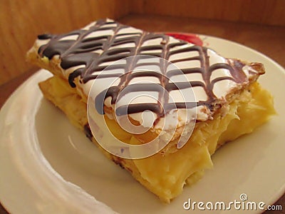 Custard Slice With Chocolate Webbing. Stock Photo