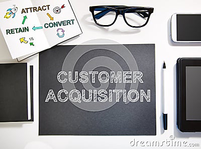 Customer Acquisition concept with black and white workstation Stock Photo