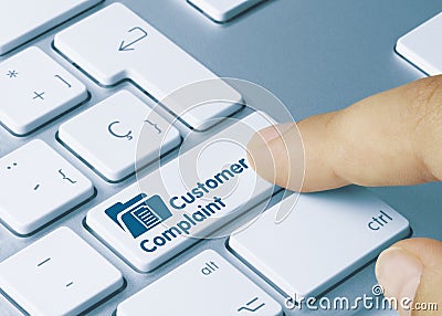 Customer Complaint - Inscription on Blue Keyboard Key Stock Photo