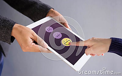 Customer Experience Concept. Happy Client Pressing a Smiley Face Stock Photo