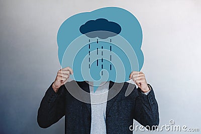 Customer Experience or Human Emotional Concept. Man Presenting his Unhappy Feeling by Drawn Line Cartoon Face on Speech Bubble Stock Photo