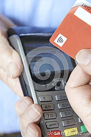 Customer Making Purchase Using Contactless Payment Editorial Stock Photo