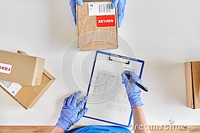 customer making return of parcel or purchase Stock Photo