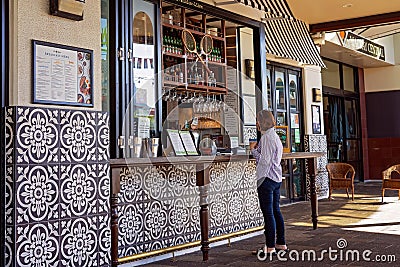 Customer Ordering At A Coffee Shop Editorial Stock Photo