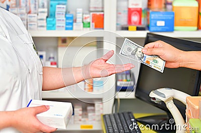 Customer paying for Medicaments in pharmacy Stock Photo