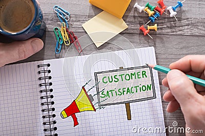 Customer satisfaction concept on a notepad Stock Photo