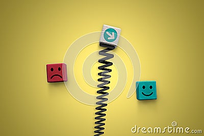 Customer satisfaction happy and sad face on wood blocks with arrow pointing to positive emotion - Business rating Stock Photo