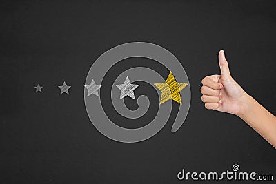 Customer satisfaction survey concept. Thumb up pointing at posit Stock Photo