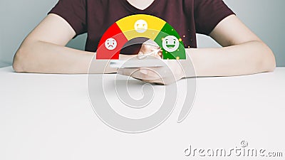 Customer satisfaction very good service with smart phone, impression of take care and attention, choose a smiley face icon, answer Stock Photo