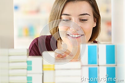 Customer searching medicines in a pharmacy Stock Photo