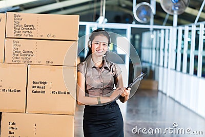 Customer Service in Asian logistics warehouse Stock Photo