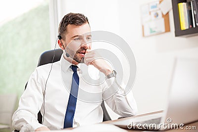 Customer service rep working in an office Stock Photo