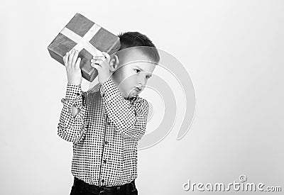 Customer. Shopping. Boxing day. New year. little boy with valentines day gift. shop assistant. Happy childhood. happy Stock Photo