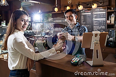 Customer take coffee from Barista Stock Photo