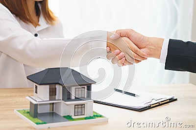 Customer or woman say yes to sign loan contract for buying new h Stock Photo
