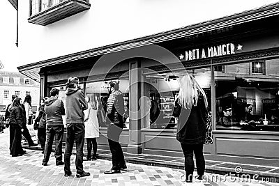 Customers Queuing Outside A High Street Branch Of Pret A Manger Editorial Stock Photo