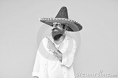 Customs and culture. Guy cheerful festive mood at party. Man in mexican hat. Explore heritage on your paternal line Stock Photo