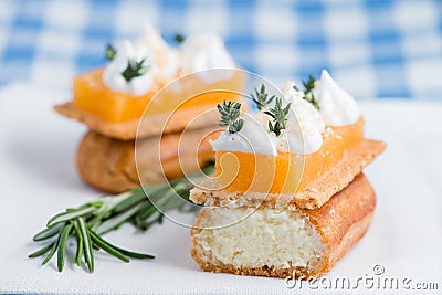 Cut delicious eclair closeup cream decorated Stock Photo