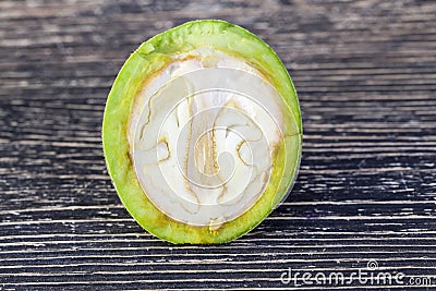 cut green walnut Stock Photo