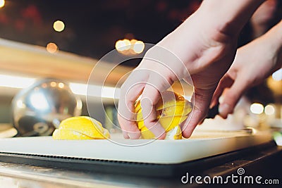 Cut lemon peels into strips. Candied Lemon Zest Cooking. Series. Stock Photo