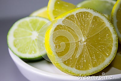 Cut Lemons and Limes Stock Photo
