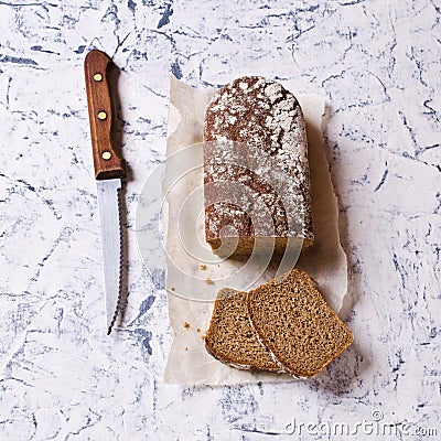 Cut loaf of rye bread Stock Photo