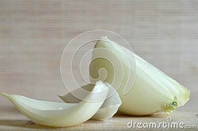 Cut off, broken piece of peeled onion Stock Photo