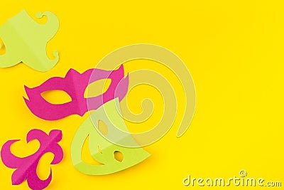 Cut out colored paper figures for the holiday Mardi Gras, colour background. Stock Photo