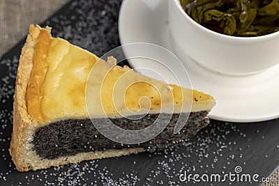 a cut piece of cake with poppy seed filling Stock Photo