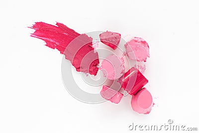 Cut pink lipstick with smear of one, flat lay Stock Photo