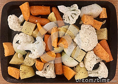 Cut up vegetables ready to go into the oven Stock Photo