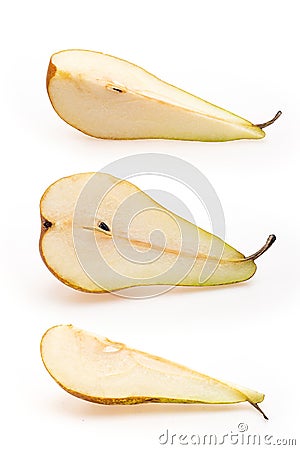 Cut yellow pear fruits. Collection of yellow pear pieces of different shapes on white background Stock Photo