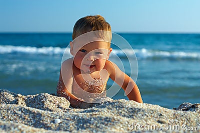 Download Cute Active Baby Boy Playing In Sand On Beach Stock Image ...