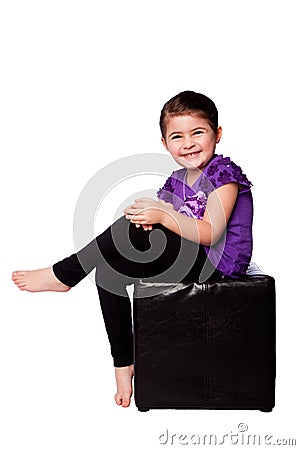 Cute adorable girl sitting Stock Photo