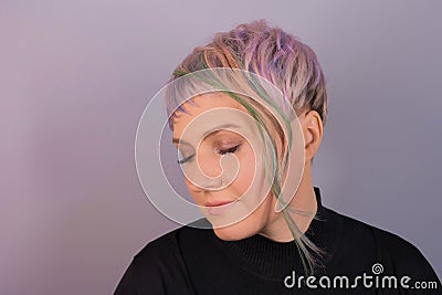 Cute adult girl caucasian portrait with closed eyes with stylish bob bob hairstyle color coloring on studio background Stock Photo