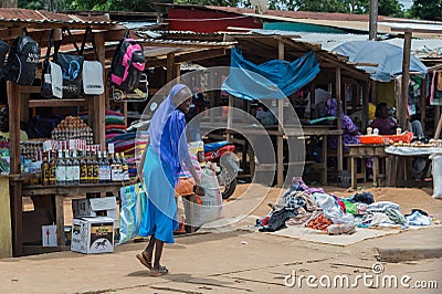 Cute African looked back, going on the market (Bomassa, Congo Republic) Editorial Stock Photo