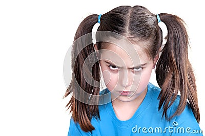 Cute angry girl with funny grimace Stock Photo